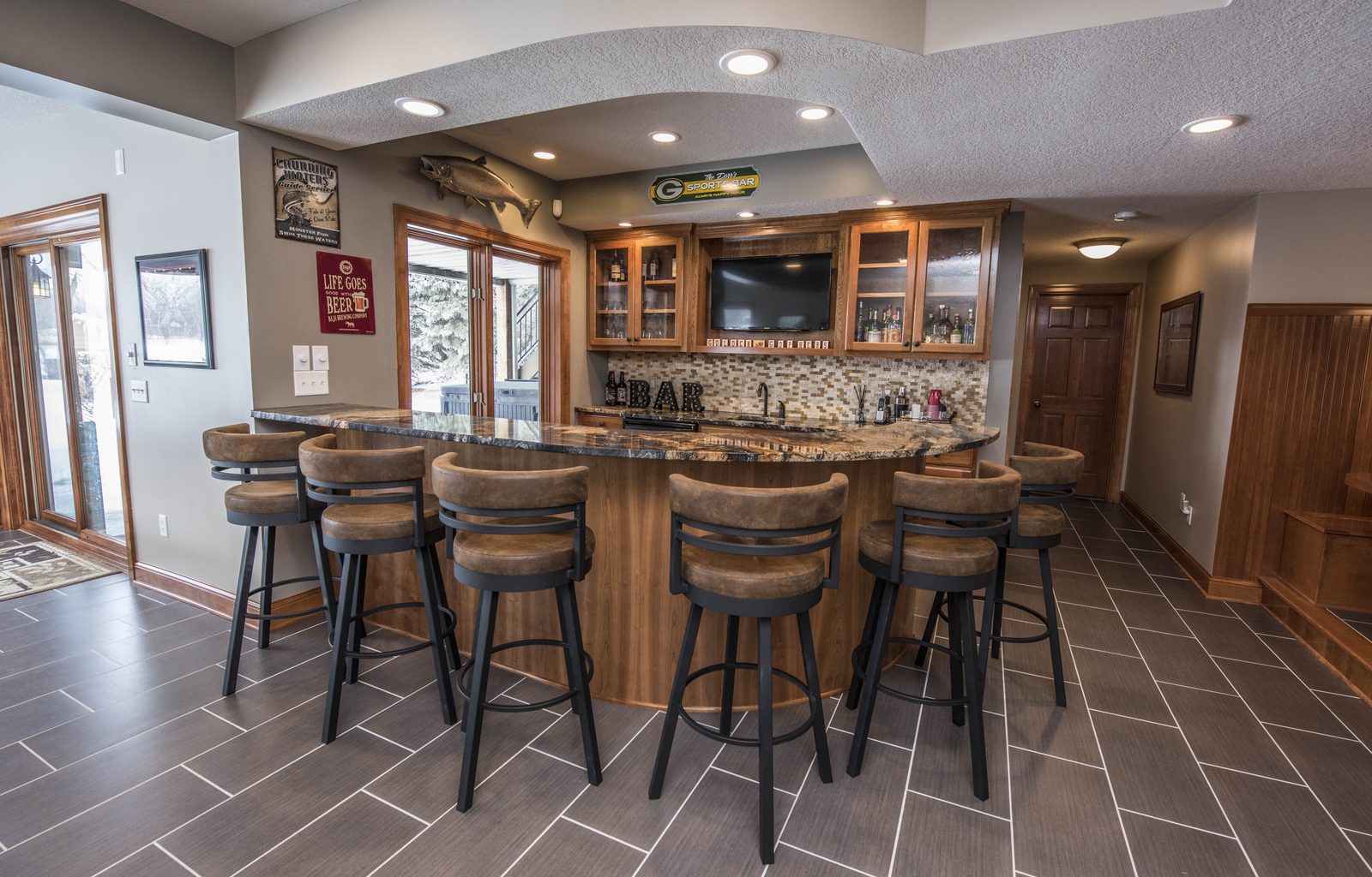 Finished basement bar and seating area in Burnsville, MN
