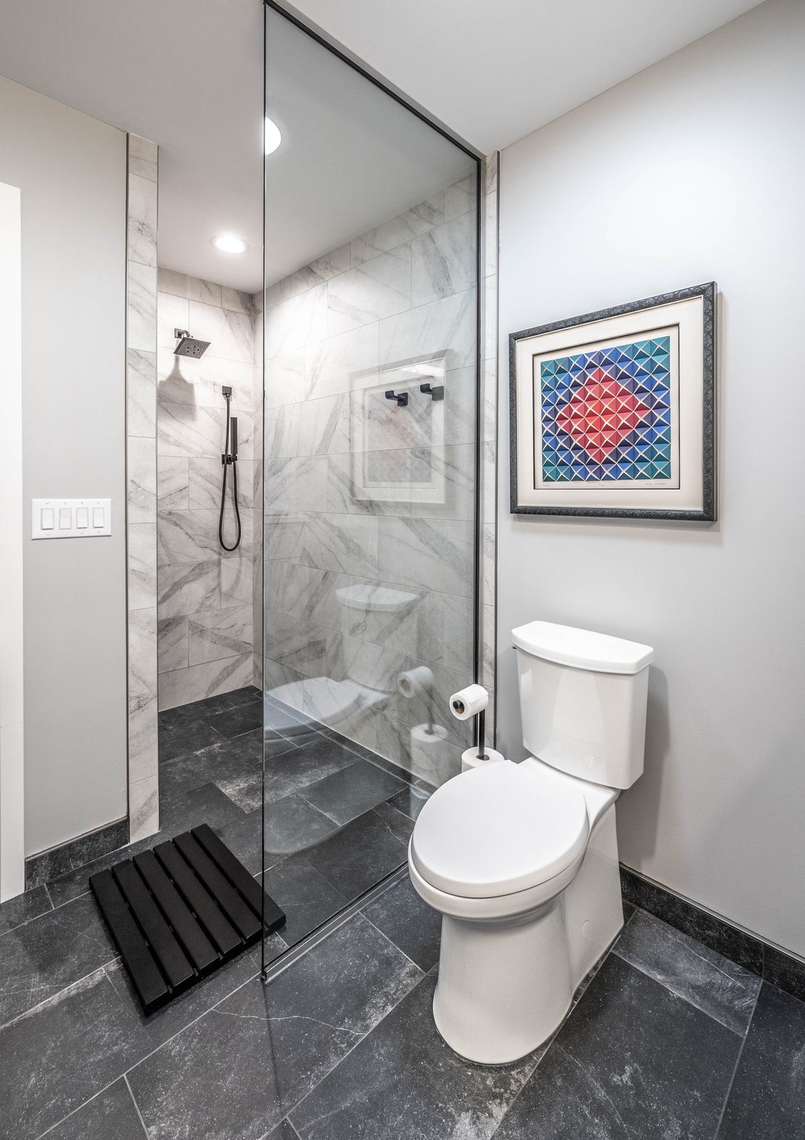 Bathroom remodel with a glass shower in Bloomington, MN